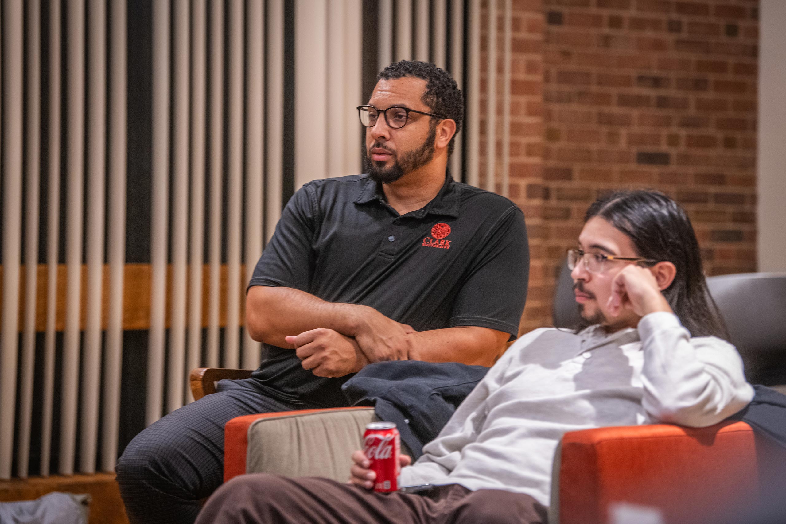 Joseph Corazzini, vice president for government and community relations at Clark attends a group discussion with the Men of Color Alliance