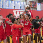 Clark University men's basketball team celebrates win in 2025 NEWMAC championship game