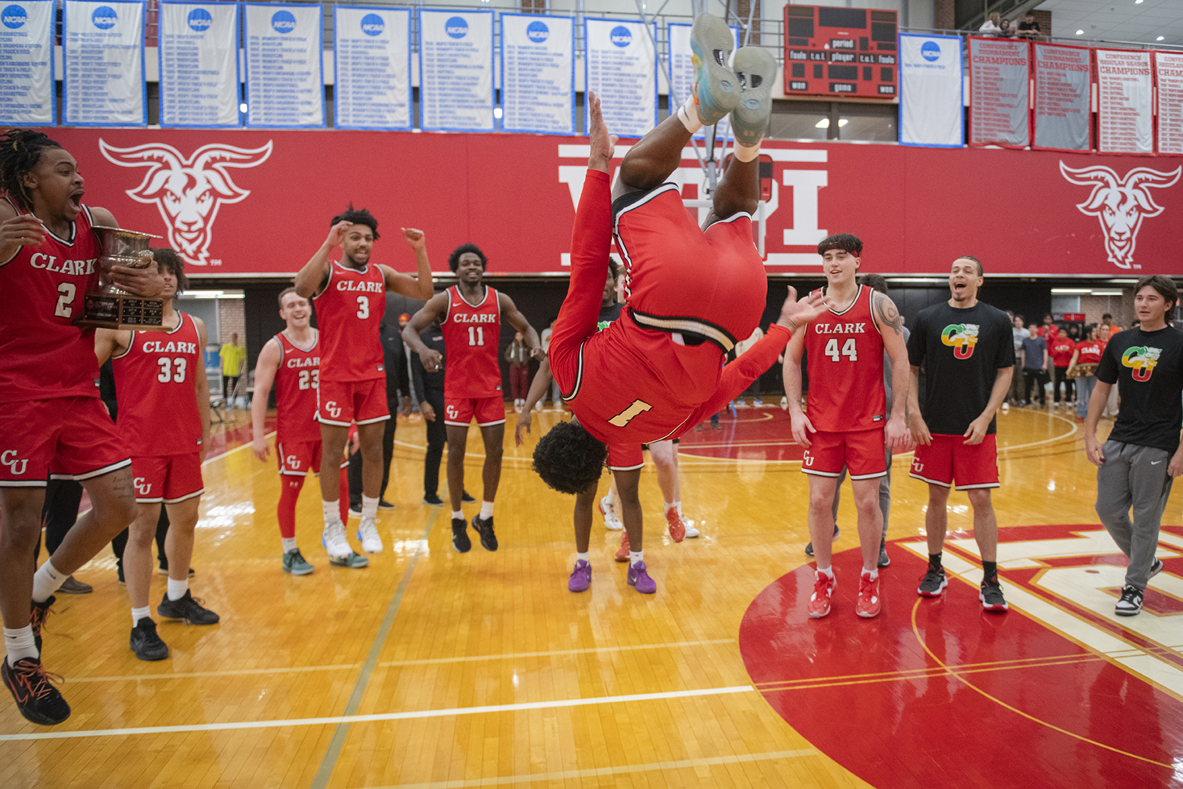 Clark University men's basketball team celebrates win in 2025 NEWMAC championship game