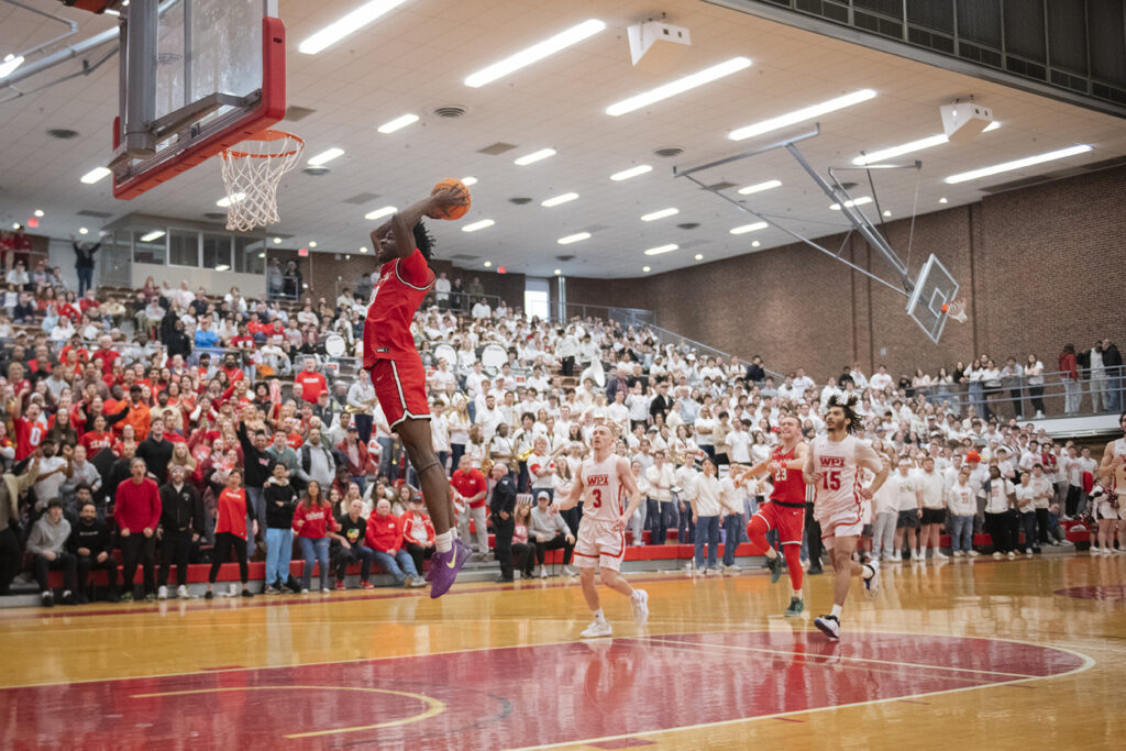 basketball player drives to net