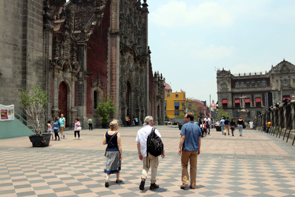 Professors Yelena Ogneva-Himmelberger, Tim Downs, and Morgan Ruelle stroll in front of the Mexico City Metropolitan Cathedral, which had been sinking and in danger of collapse until it was saved by major remedial engineering. Like many structures in Mexico City, the sinking was caused by the over-exploitation of the aquifer, leading to the differential settlement of the cathedral’s foundation.