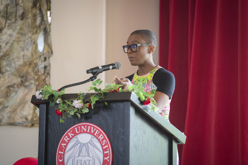 people pose for photos at multicultural graduation ceremony