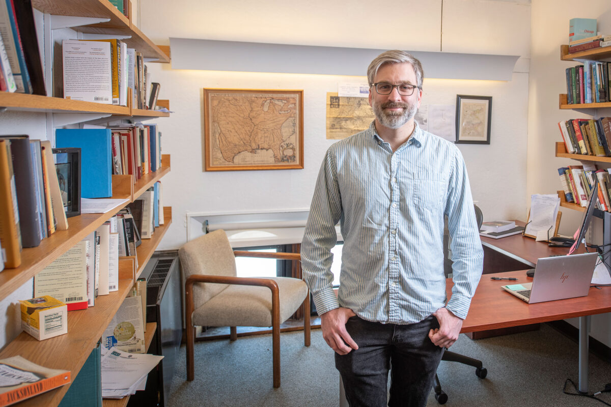 Nathan Braccio standing in his office
