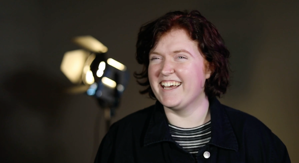 student smiles during interview