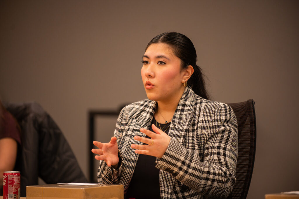 woman speaks on panel