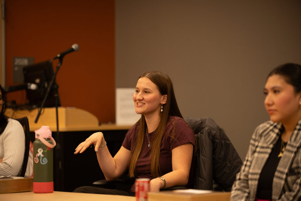 woman speaks on panel