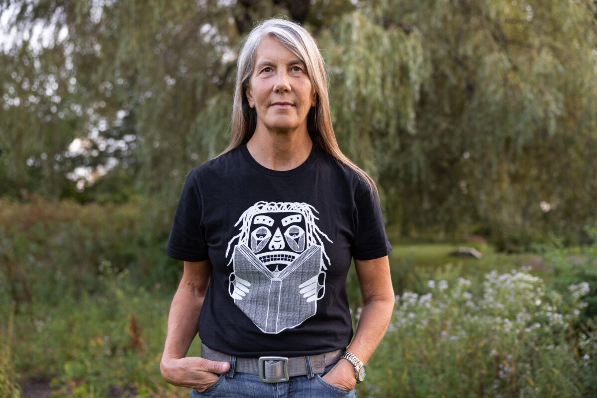 person standing in meadow