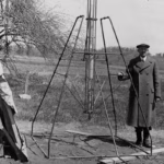 Robert Goddard with the first liquid fuel rocket, prior to launch on March 16, 1926