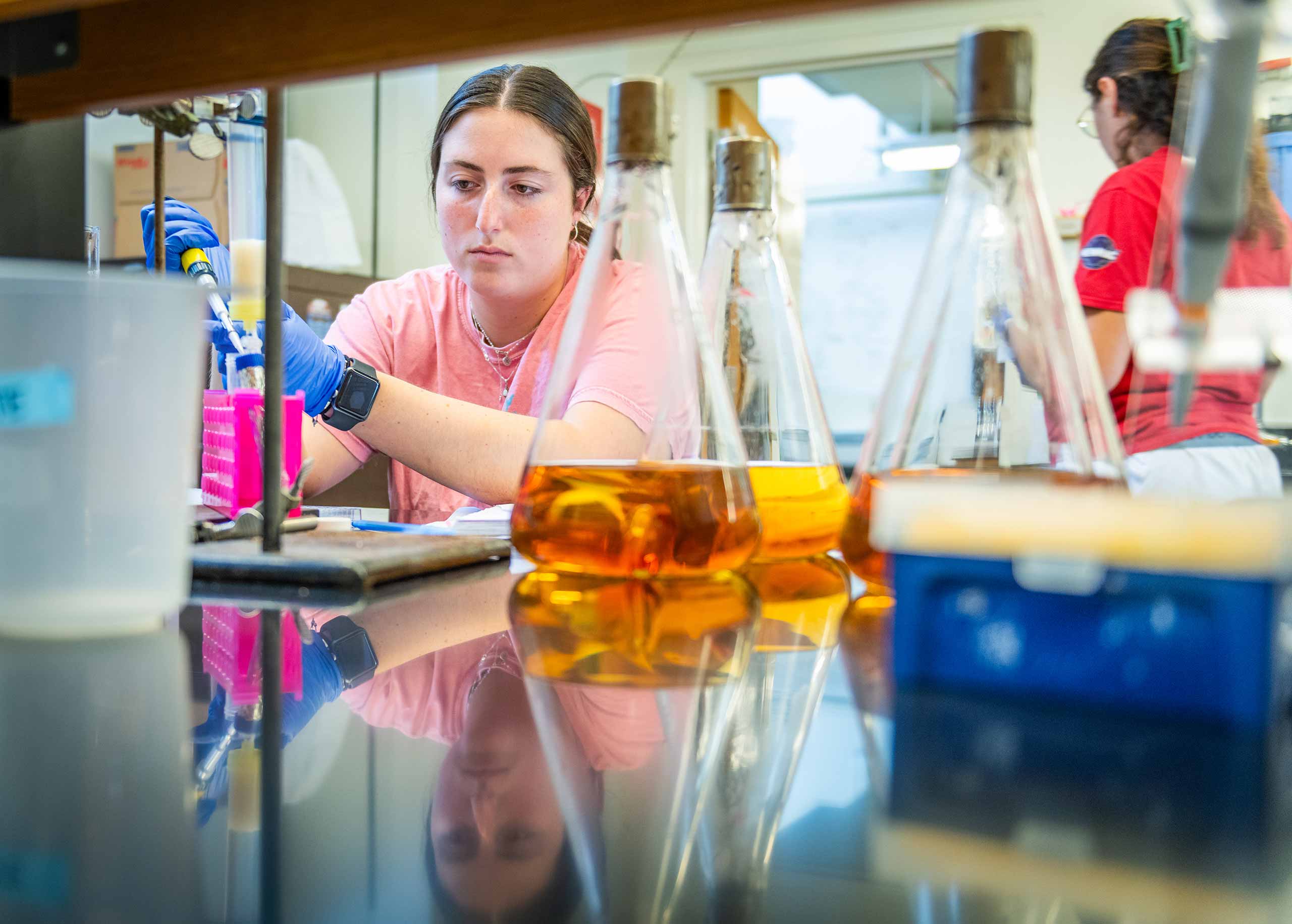 Megan Hill purifies proteins in the Spratt Lab in the Sackler Science Building