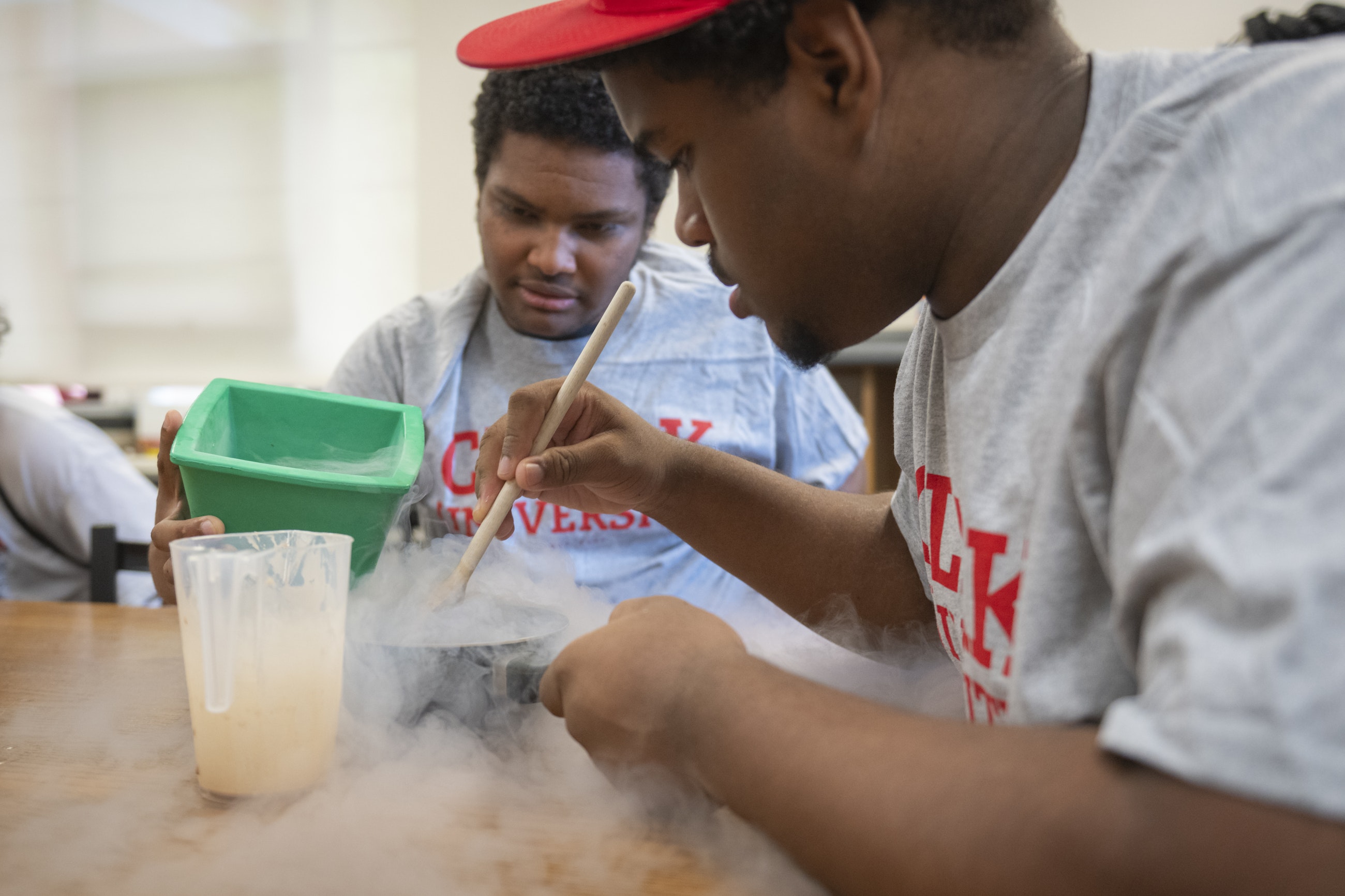 Worcester high school students conducting chemistry experiment at Clark