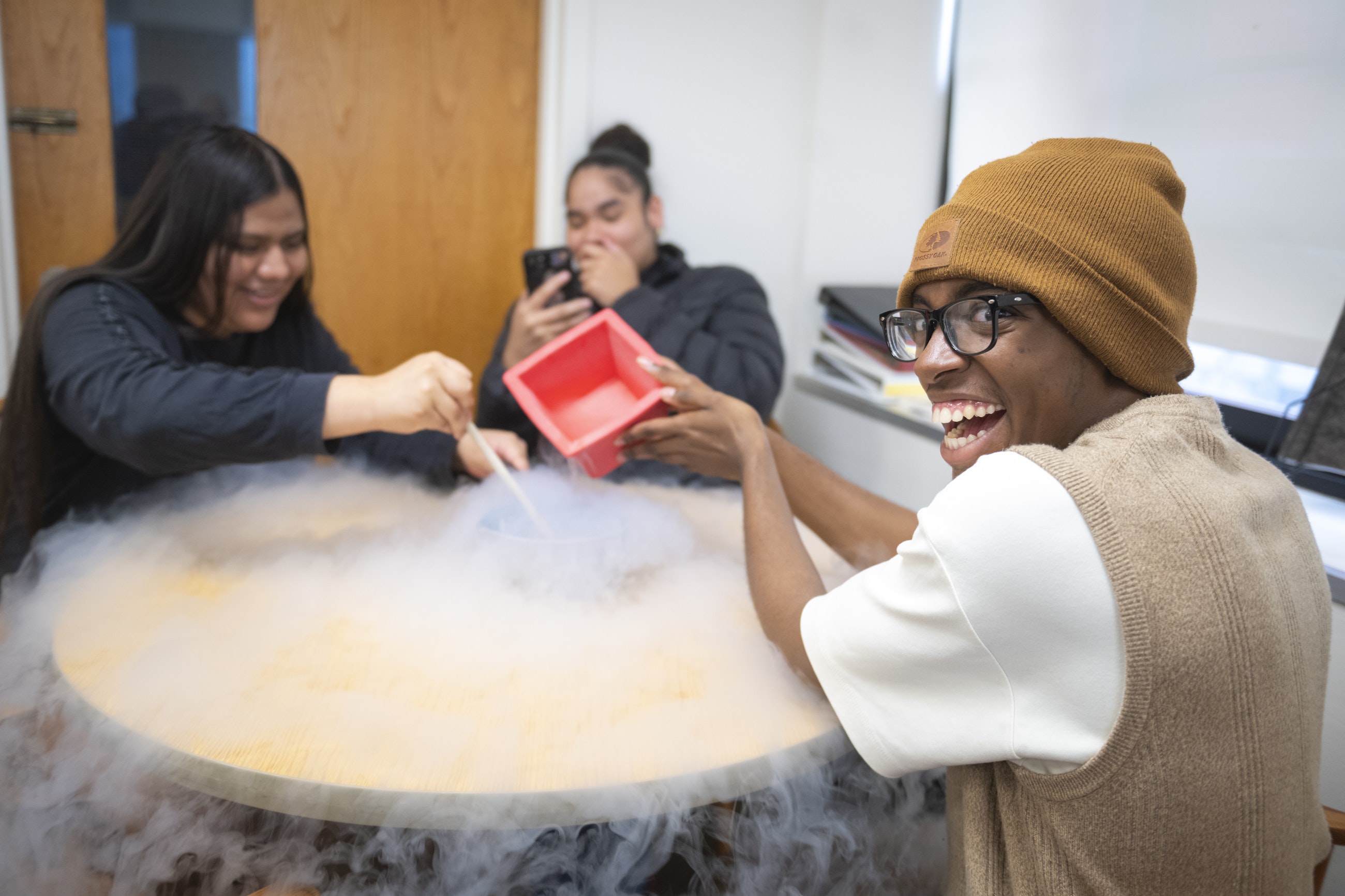 Worcester high school students conducting chemistry experiment at Clark