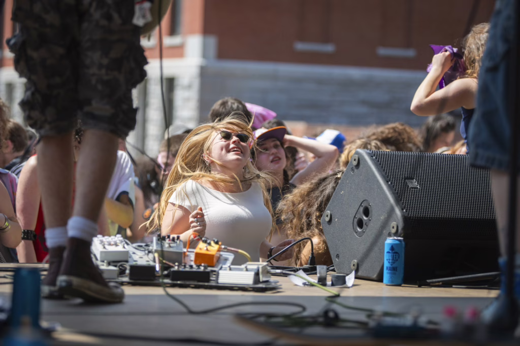 students on campus green