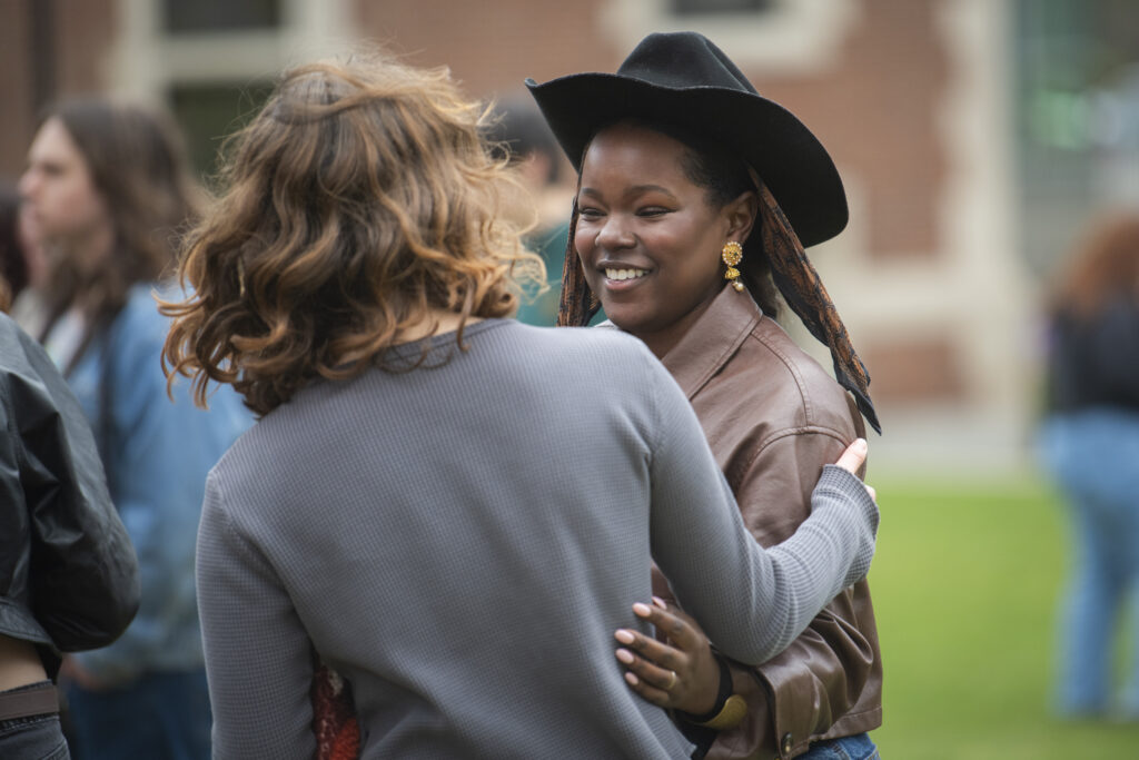 students celebrate on campus green