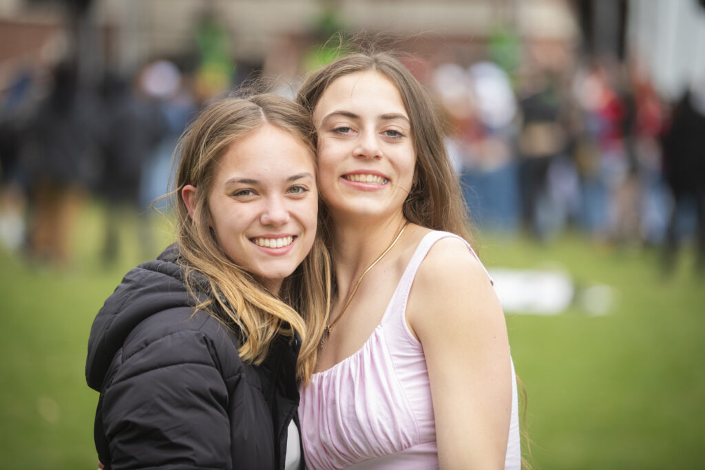 students celebrate on campus green