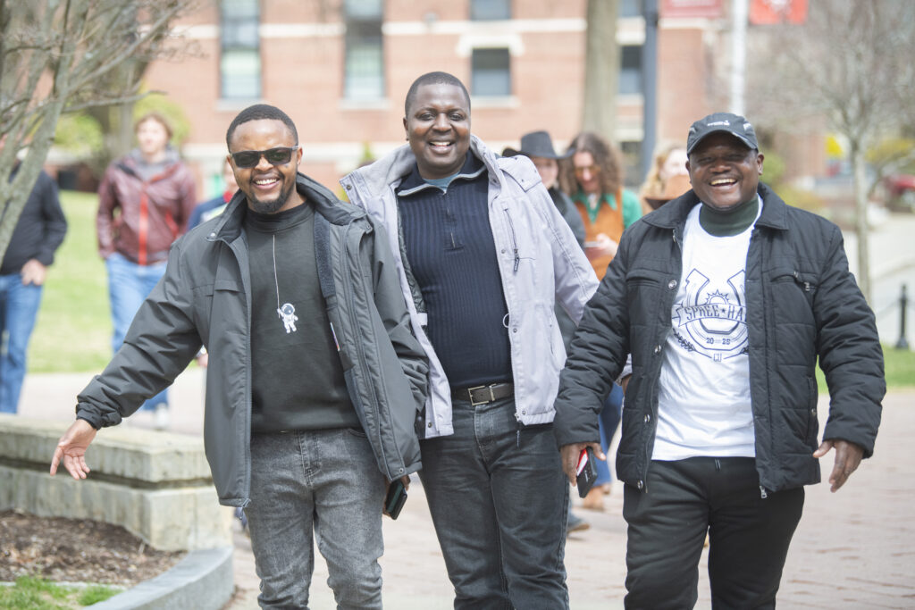 students celebrate on campus green