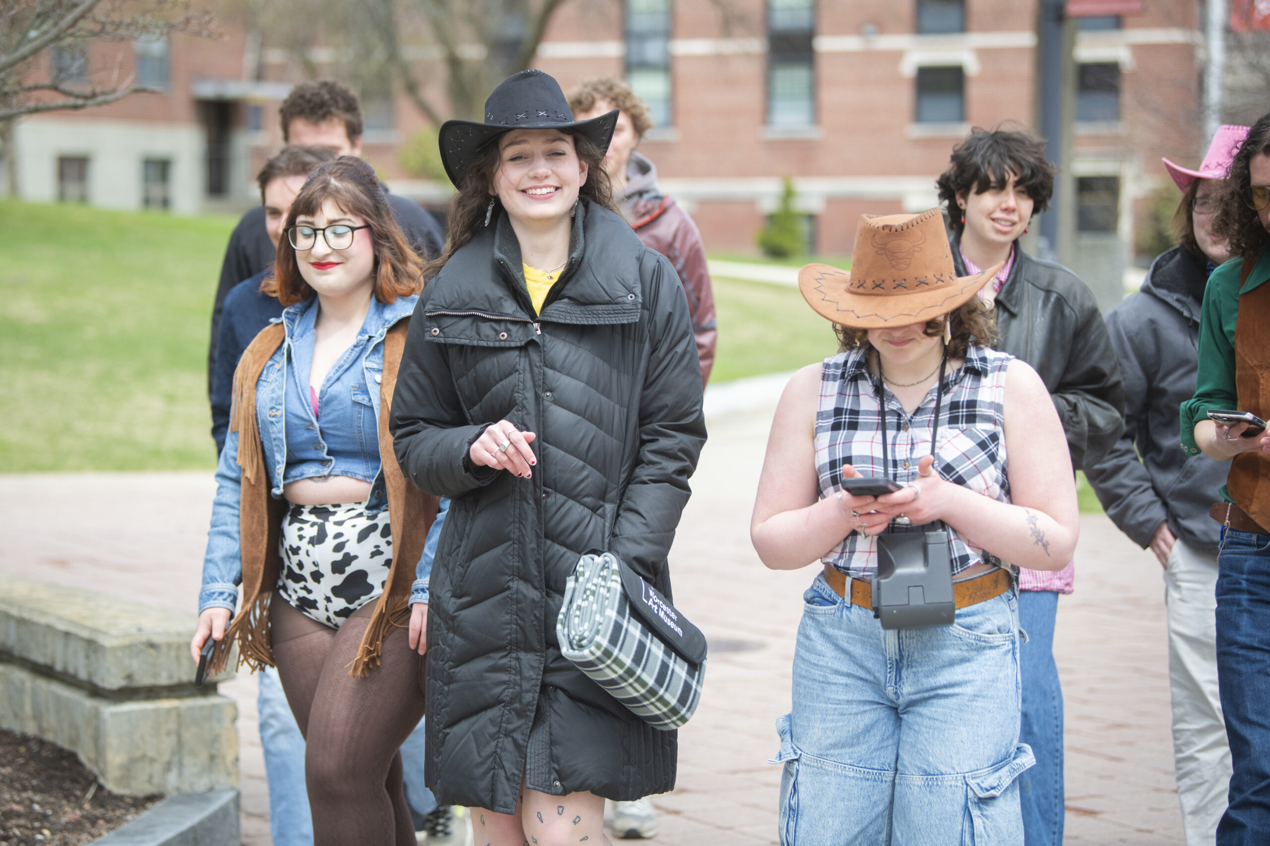 students celebrate on campus green