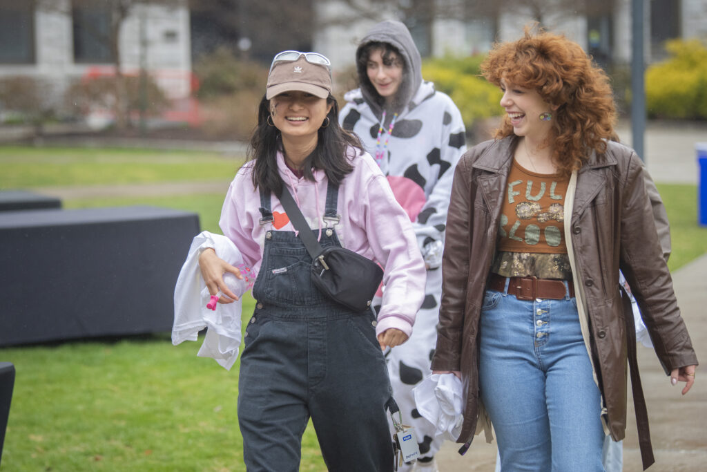 students celebrate on campus green