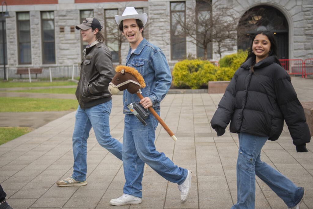 students celebrate on campus green