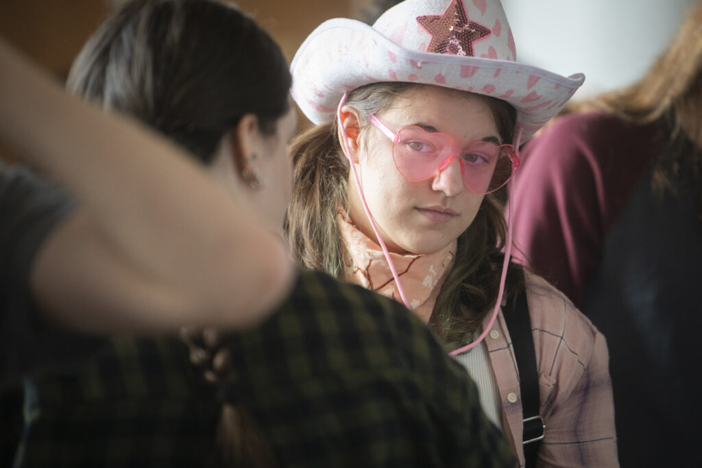 student wearing cowboy hat