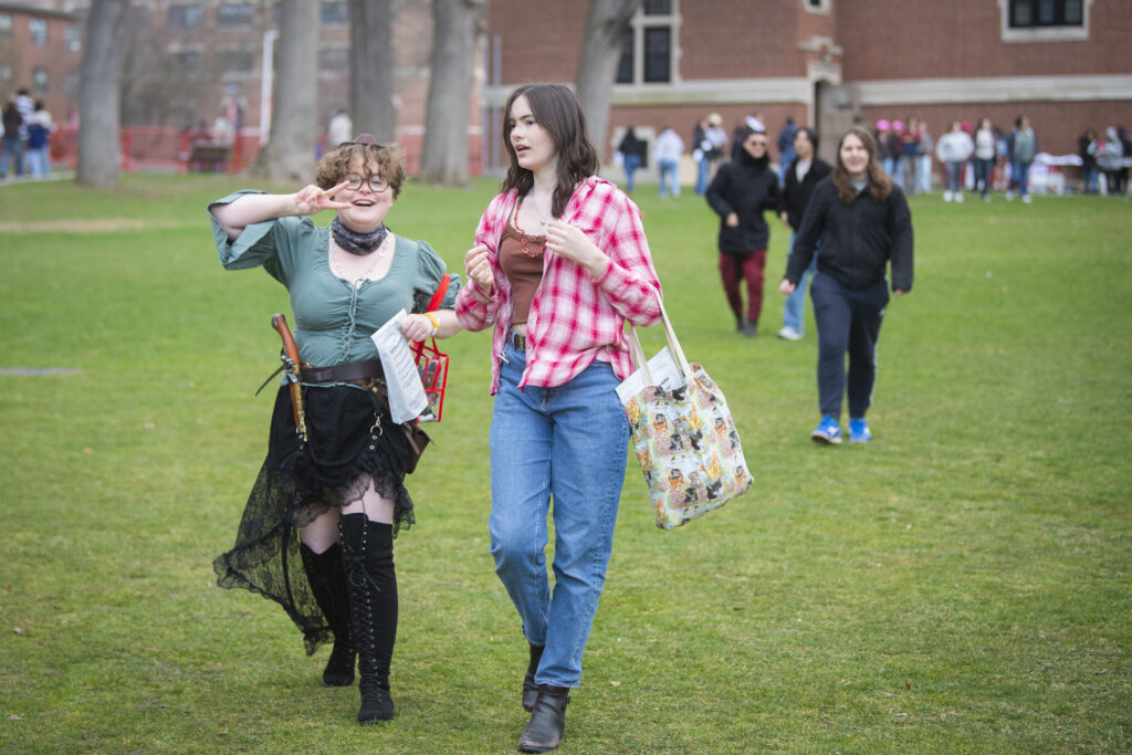 students celebrate on campus green