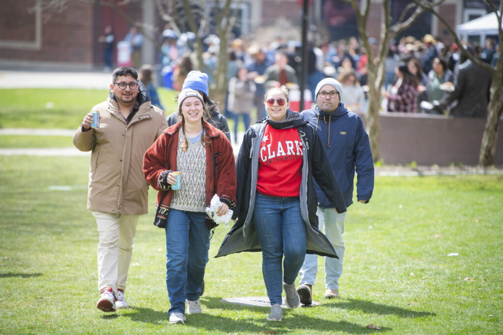 students celebrate on campus green