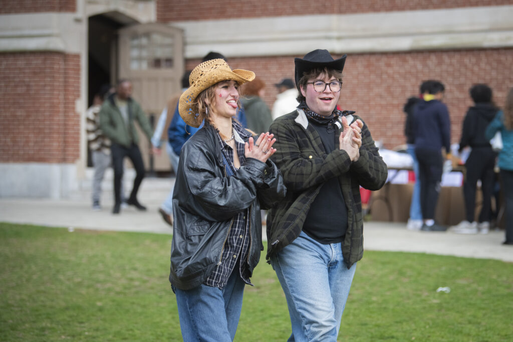 students celebrate on campus green