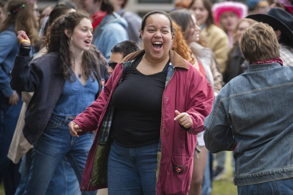 students celebrate on campus green