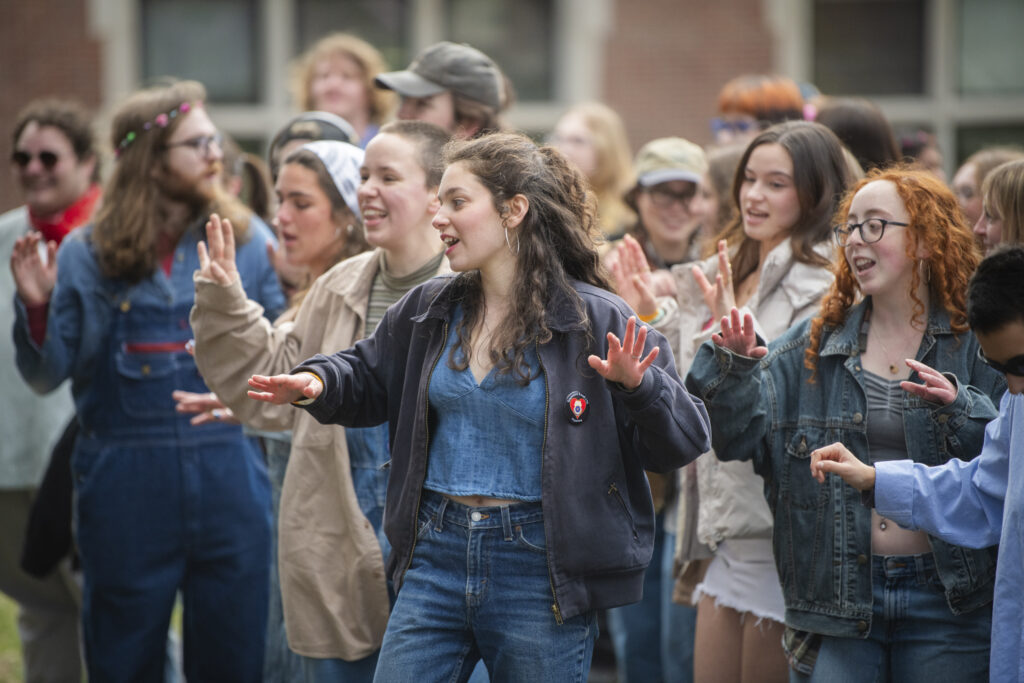 students celebrate on campus green