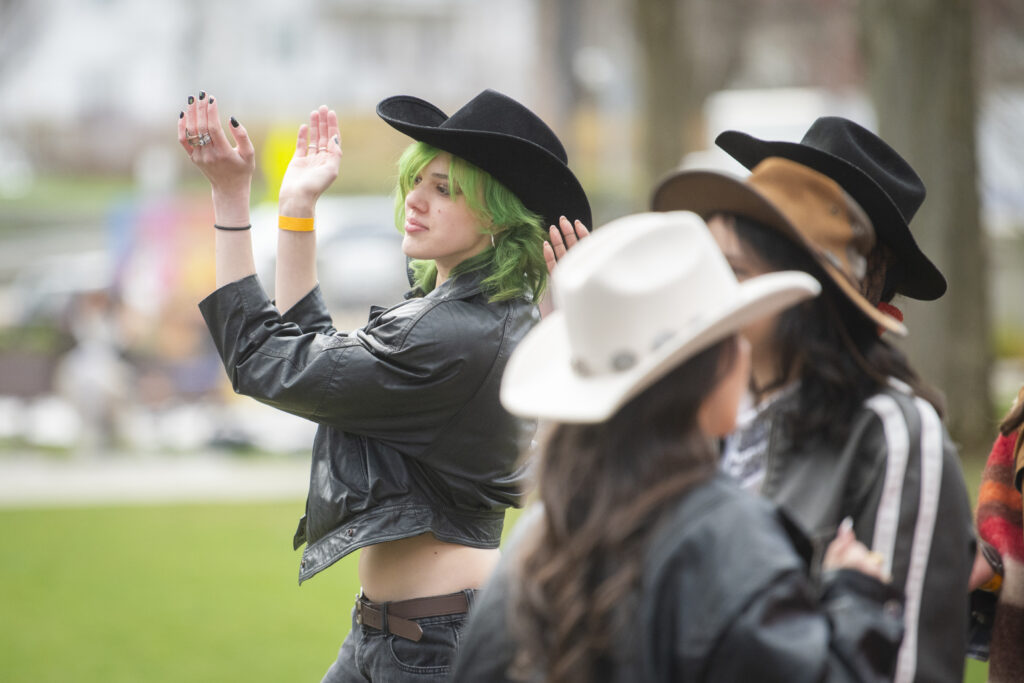 students celebrate on campus green