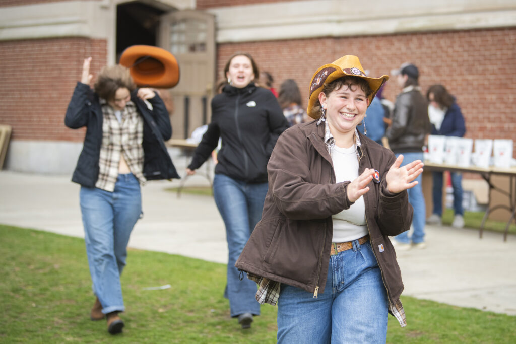 students celebrate on campus green
