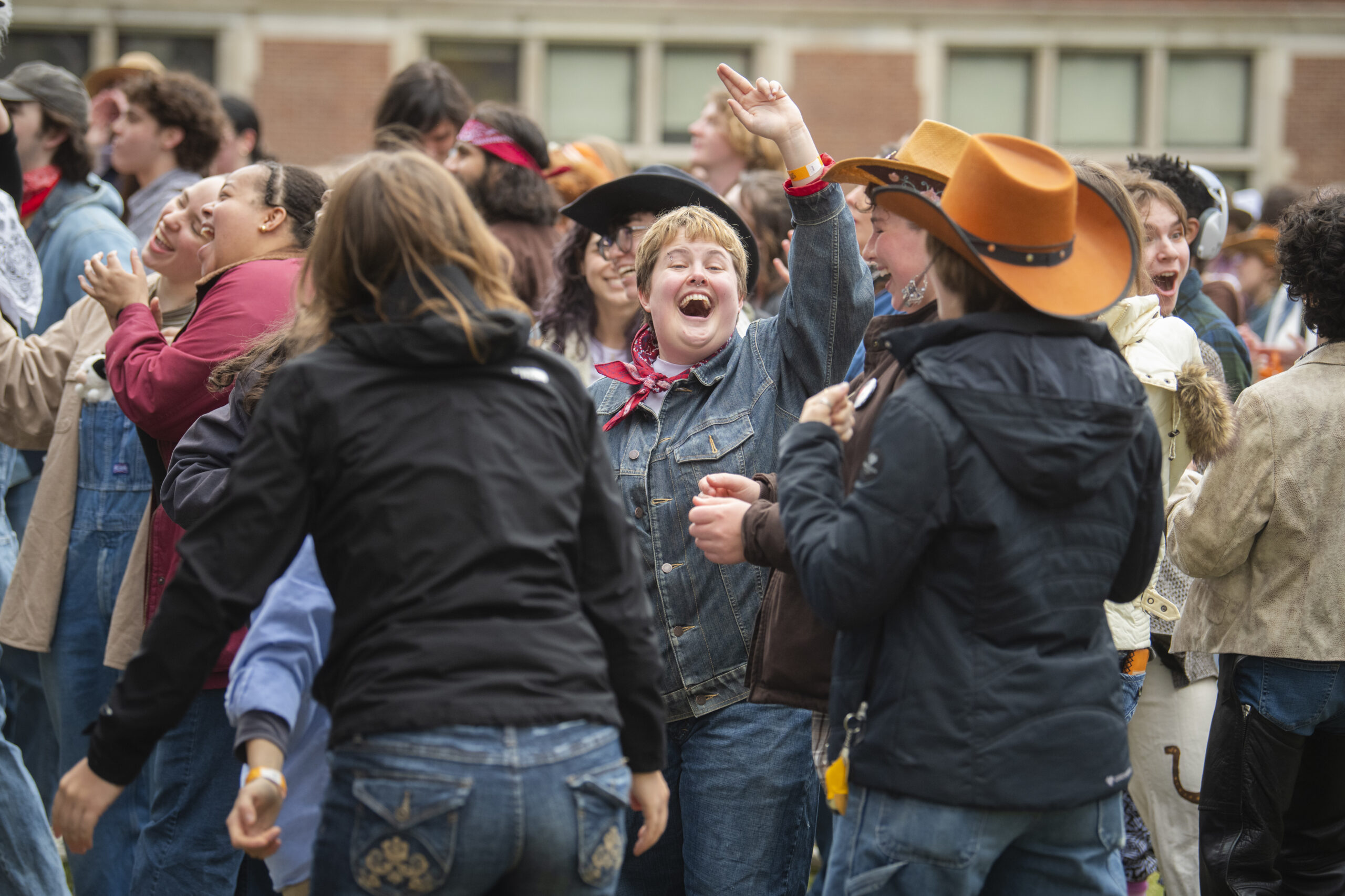 students celebrate on campus green