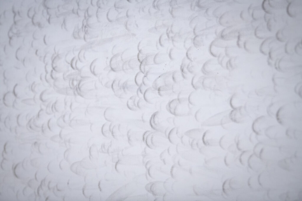 The Kneller Athletic Center squash court walls have taken a beating over the years.