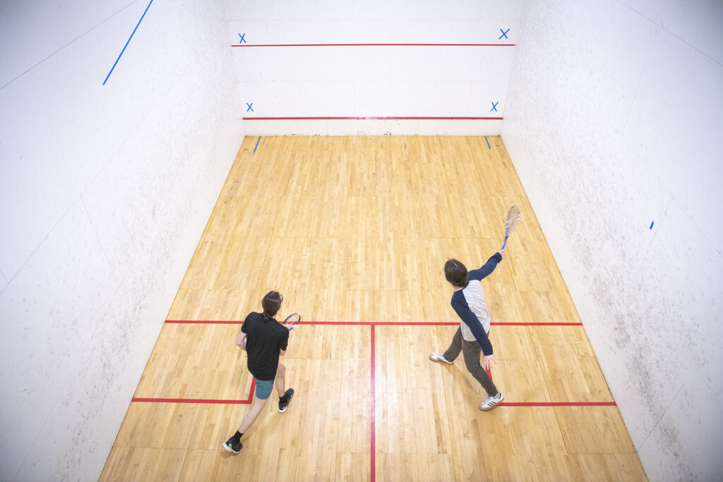 Clark Club Squash practices in the Kneller Athletic Center.
