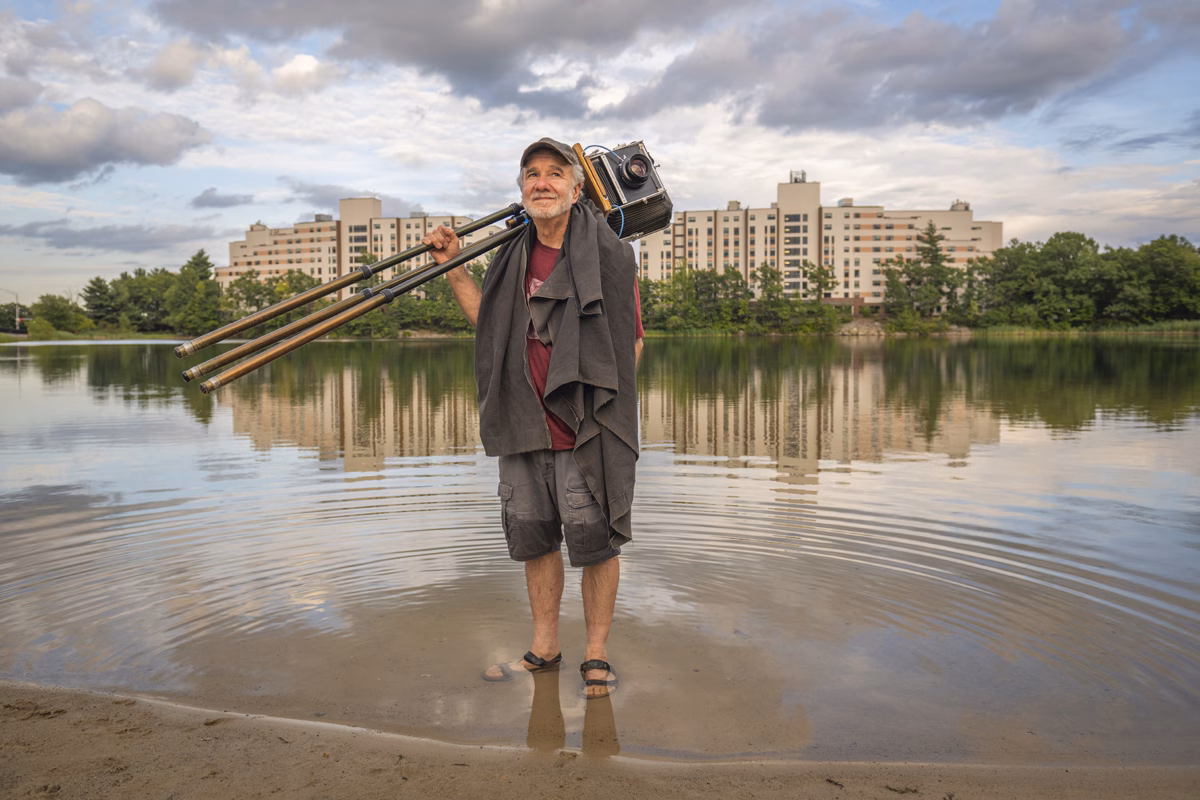 Stephen DiRado at Bell Pond with the large-format view camera he used to create the Bell Pond photo collection, 2026