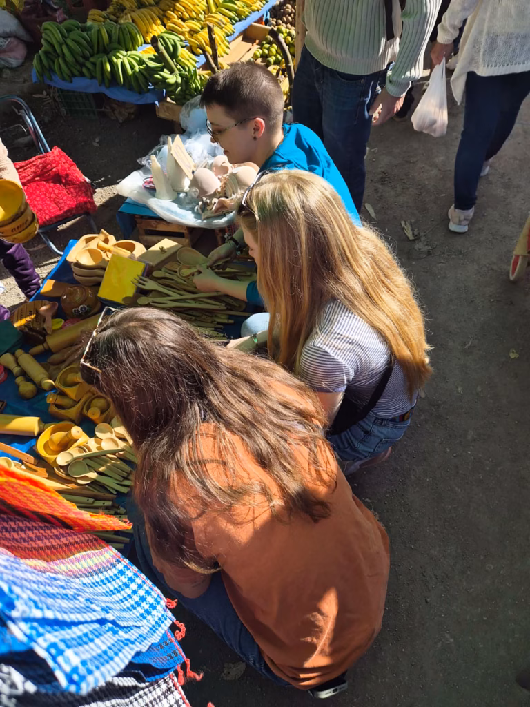Students visiting a market in Peru