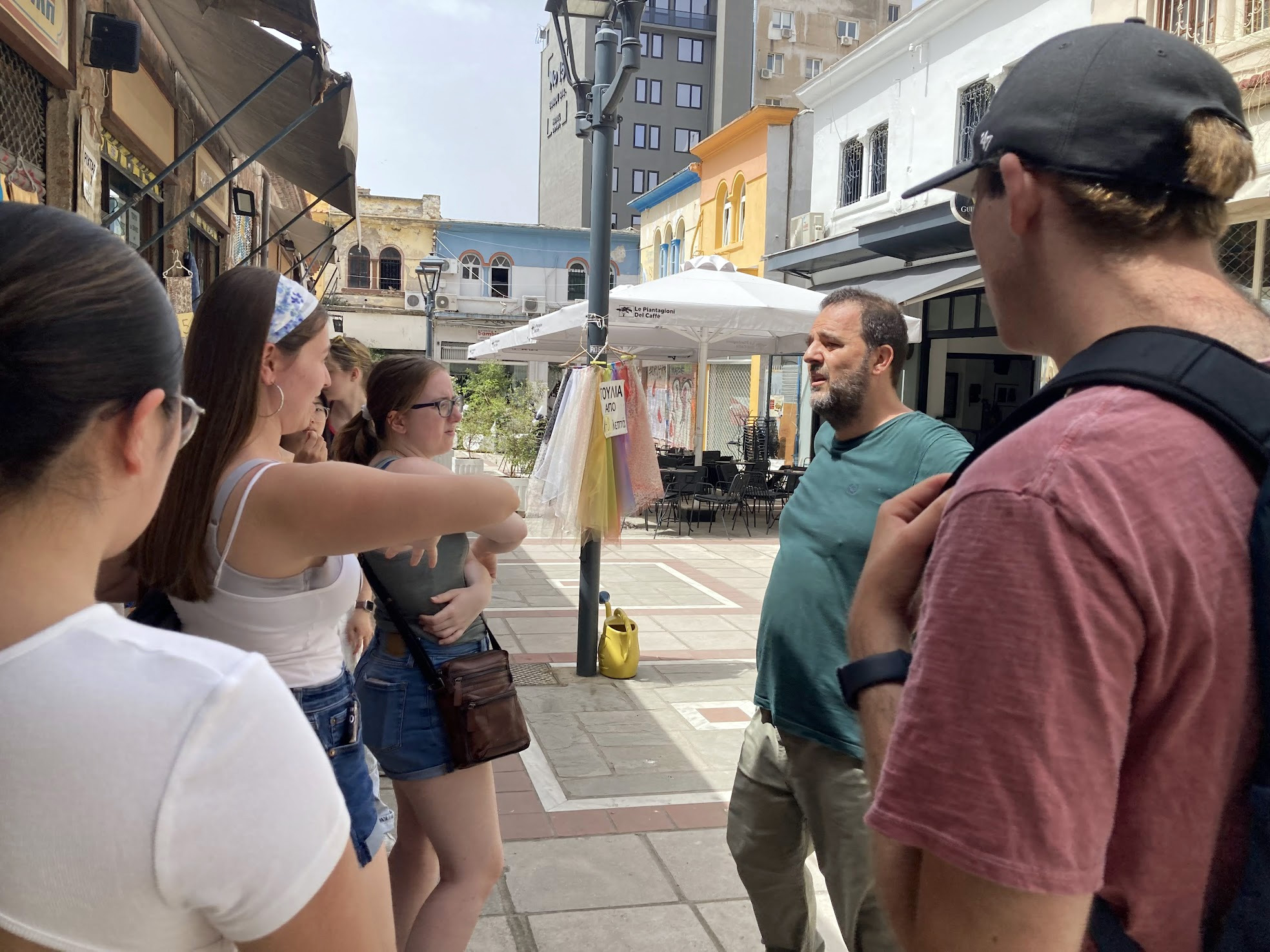 Students visiting a neighborhood in Greece
