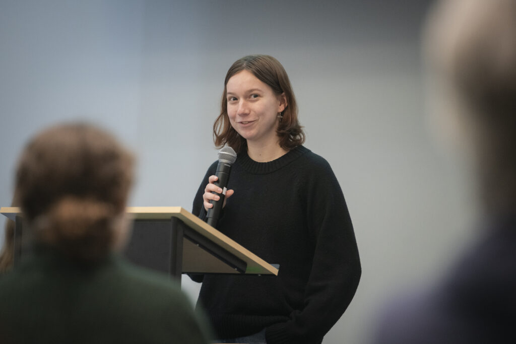 student speaks at podium