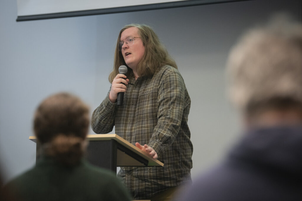 student speaks at podium