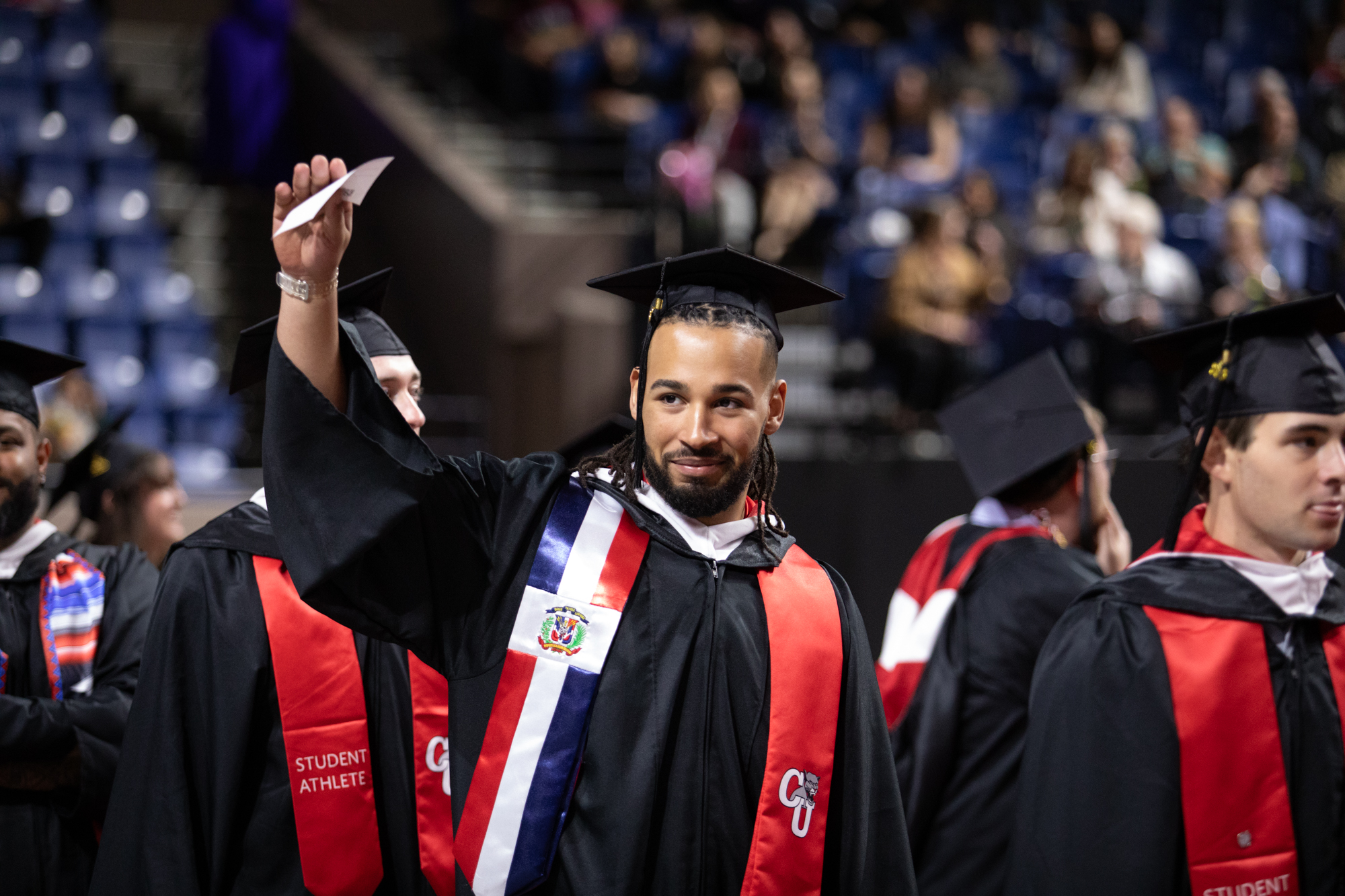 Students enter the DCU Center for the Clark University Commencement.