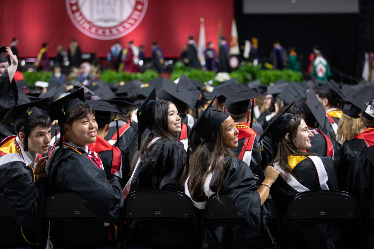 graduates at commencement ceremony