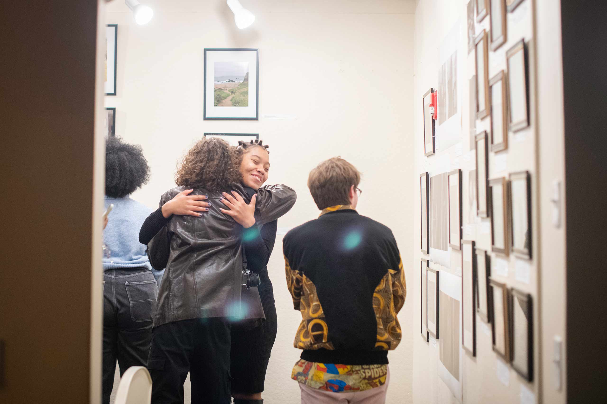 Larriyah Graham embraces at an art opening