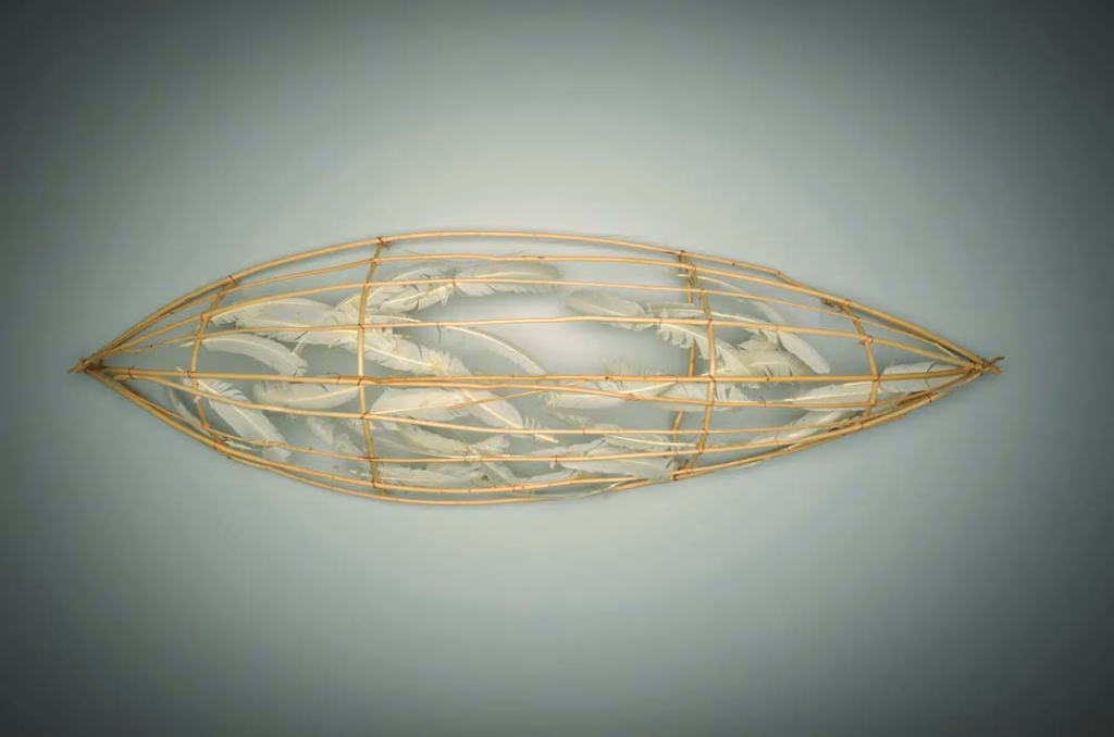 Feather Canoe, made of peeled willow saplings, feathers and copper wire by Ho-Chunk sculptor, Truman Lowe
