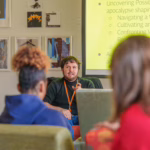 person speaks to class