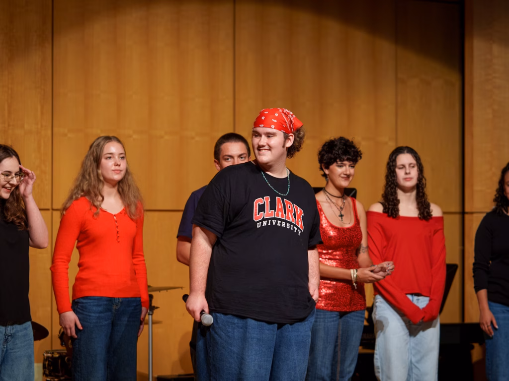 performing arts show with people singing on stage