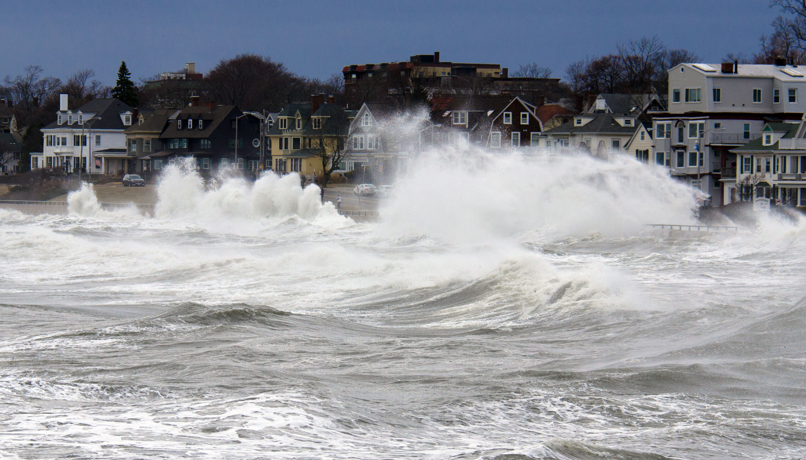 How can New England coastal communities best develop climate resilience?