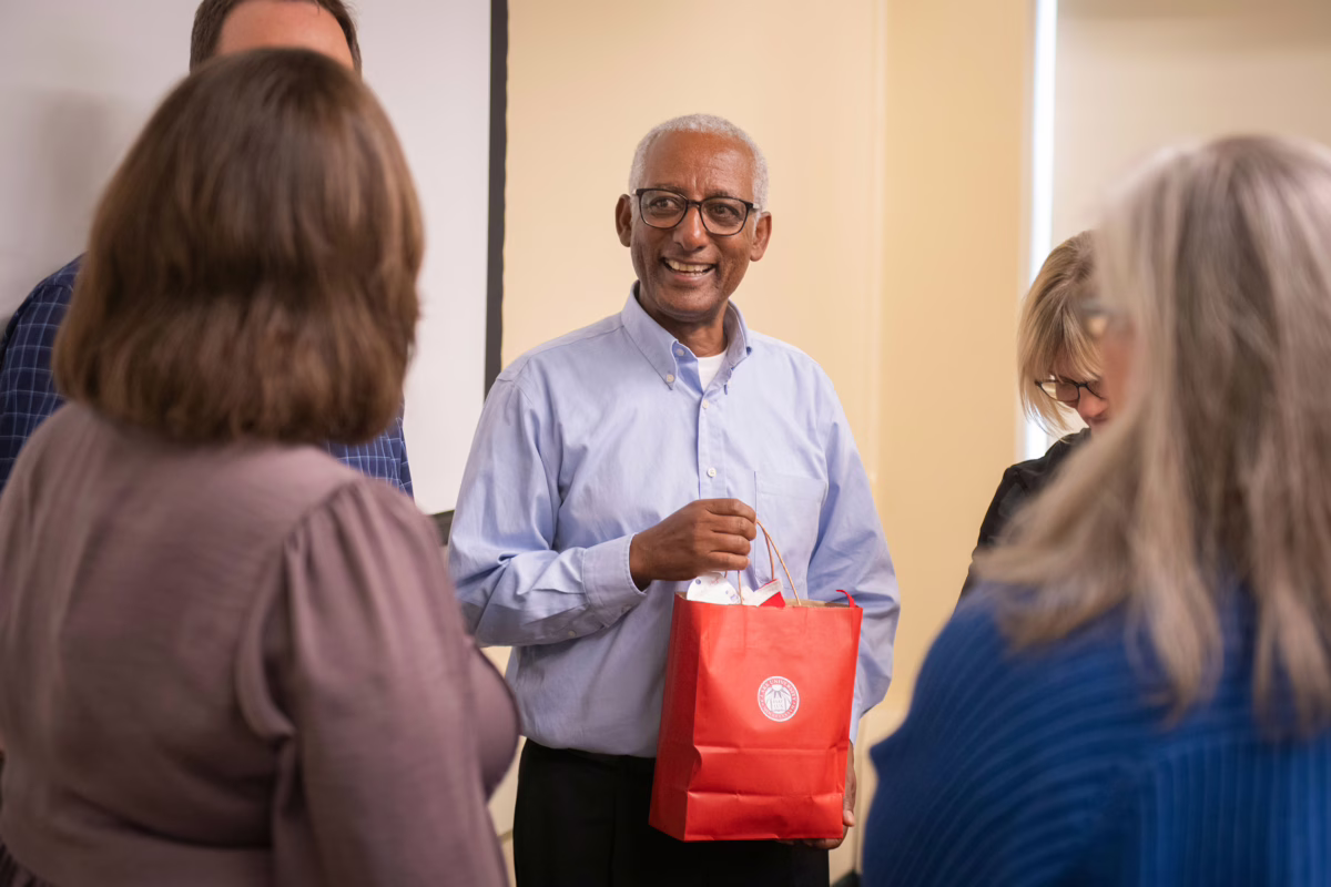 Dr. Teferi Abate speaks with Clark faculty
