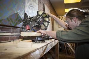 Vesenka works on a project in a Little Center workshop.