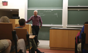 Charlie Bresler, M.A. '83, Ph.D. '84, speaks with alumni at Reunion 2015.