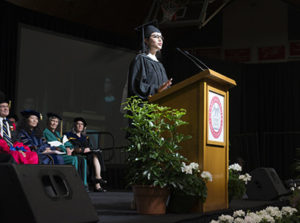 Magaly Preciado Reyes speaking at graduation