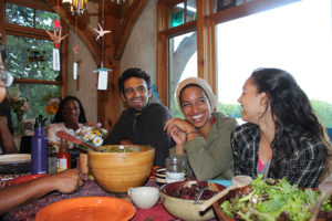 Jonah Vitale-Wolff ’02 (left) and Leah Penniman ’02, M.A.T. ’03 (center), host social justice programs at Soul Fire Farm.
